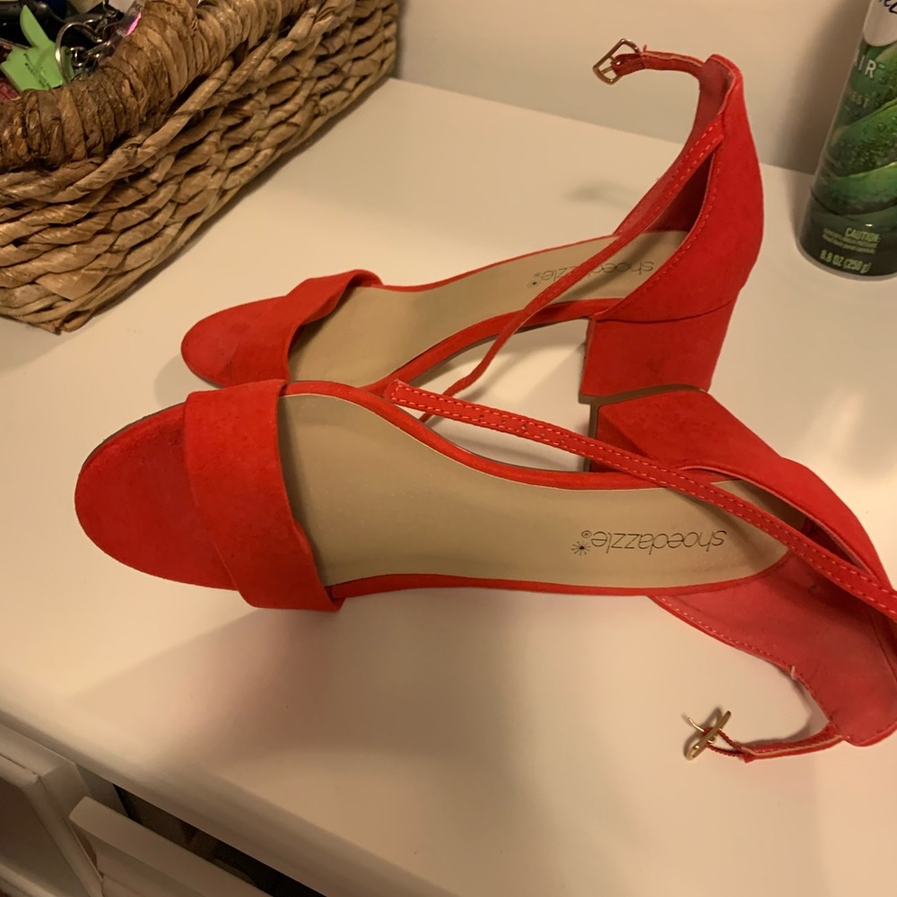 Short red platform heel.